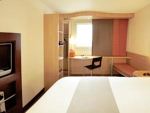 Hotel ibis Braga 객실 침대