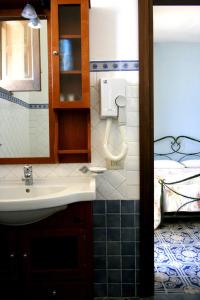 Vonios kambarys apgyvendinimo įstaigoje Il Delfino