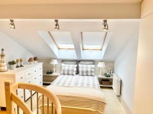 מיטה או מיטות בחדר ב-Edel Exclusive Apartments Villa Marea 102 Especially for You