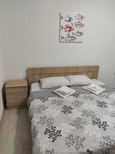 Postel nebo postele na pokoji v ubytování Villa Ivanovi