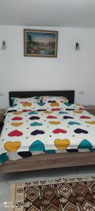 Een bed of bedden in een kamer bij Casa M