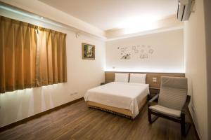 Llit o llits en una habitació de MuXia Fengqing Homestay
