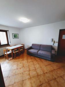 Posezení v ubytování Comano Terme Apart