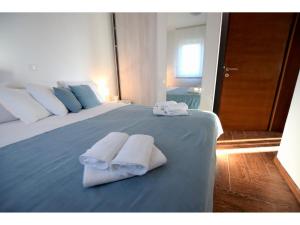 Postel nebo postele na pokoji v ubytování Apartment Dinko