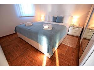 Postel nebo postele na pokoji v ubytování Apartment Dinko
