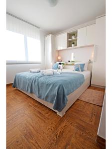 Postel nebo postele na pokoji v ubytování Apartment Dinko