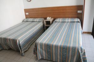 Postel nebo postele na pokoji v ubytování Pension Terminal