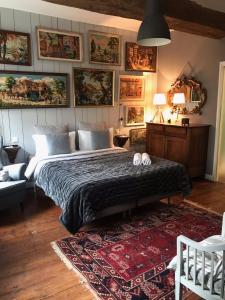 Voodi või voodid majutusasutuse B&B du Cloître toas