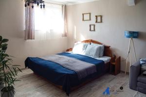 Posteľ alebo postele v izbe v ubytovaní FruPi-Apartmanok