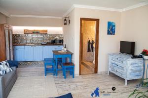 Kuchyňa alebo kuchynka v ubytovaní FruPi-Apartmanok
