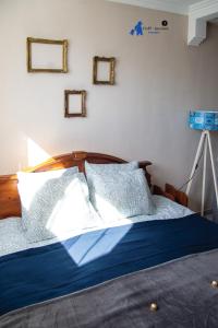 Posteľ alebo postele v izbe v ubytovaní FruPi-Apartmanok
