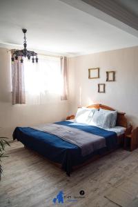 Posteľ alebo postele v izbe v ubytovaní FruPi-Apartmanok