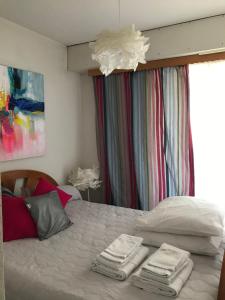 Säng eller sängar i ett rum på Apartment Prado