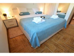 Postel nebo postele na pokoji v ubytování Apartment Dinko