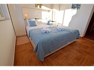 Postel nebo postele na pokoji v ubytování Apartment Dinko