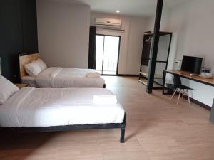 Postel nebo postele na pokoji v ubytování Sinai Hotel