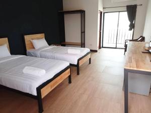 Postel nebo postele na pokoji v ubytování Sinai Hotel