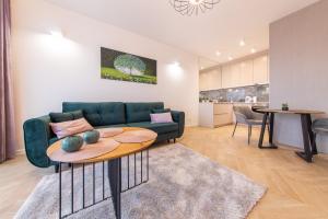 Kuchyňa alebo kuchynka v ubytovaní VIP Apartamenty Butikowa