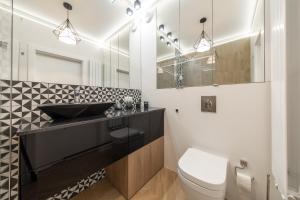 Kúpeľňa v ubytovaní VIP Apartamenty Butikowa