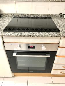 Kuchyňa alebo kuchynka v ubytovaní Apartment Rambla Tarragona Free parking
