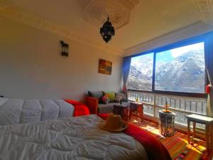 Postel nebo postele na pokoji v ubytování Riad Afla Views + 29 fotografií