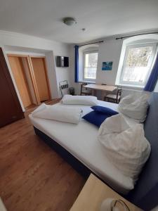 Postel nebo postele na pokoji v ubytování Ferienhaus Kolbnitz
