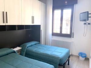 Voodi või voodid majutusasutuse B&B La coccola toas
