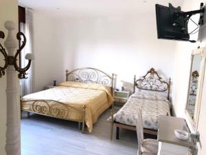 Voodi või voodid majutusasutuse B&B La coccola toas