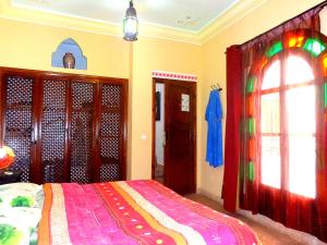 Riad Sesame tesisinde bir odada yatak veya yataklar
