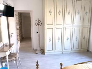 Televiisor ja/või meelelahutuskeskus majutusasutuses B&B La coccola
