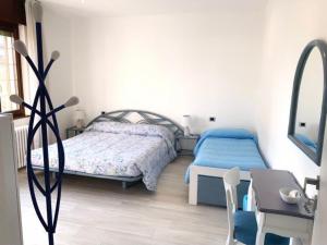 Voodi või voodid majutusasutuse B&B La coccola toas
