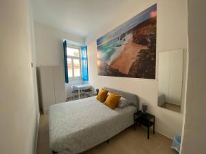 Postel nebo postele na pokoji v ubytování Iguana Guesthouse