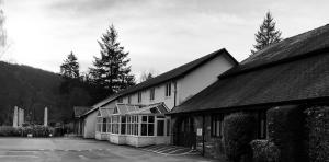 a black and white photo of a building at The Waterloo Hotel in Betws-y-coed