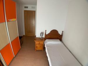 Postel nebo postele na pokoji v ubytování VUT SEGEDA Valle del Manubles