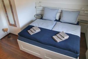 Postel nebo postele na pokoji v ubytování Edersee Aktivurlaub