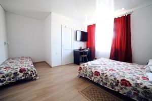 Postel nebo postele na pokoji v ubytování Villa Elena