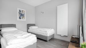 Posteľ alebo postele v izbe v ubytovaní Comfy Apartments - Park Technologiczny