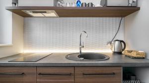 Kuchyňa alebo kuchynka v ubytovaní Comfy Apartments - Park Technologiczny