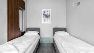 Posteľ alebo postele v izbe v ubytovaní Comfy Apartments - Park Technologiczny