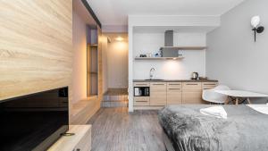 Kuchyňa alebo kuchynka v ubytovaní Comfy Apartments - Park Technologiczny