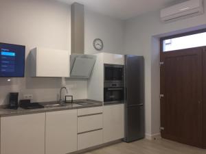 Kuchnia lub aneks kuchenny w obiekcie Apartamentos La Encarnación III