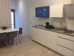 Kuchnia lub aneks kuchenny w obiekcie Apartamentos La Encarnación III