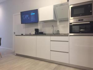 Kuchnia lub aneks kuchenny w obiekcie Apartamentos La Encarnación III