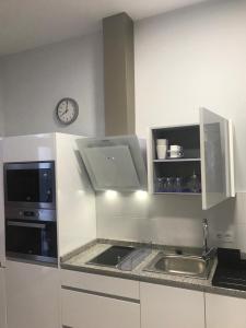 Kuchnia lub aneks kuchenny w obiekcie Apartamentos La Encarnación III