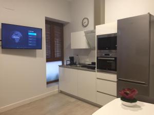 Kuchnia lub aneks kuchenny w obiekcie Apartamentos La Encarnación III