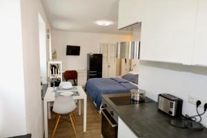 Kuchyň nebo kuchyňský kout v ubytování Frundsberg-Apartment