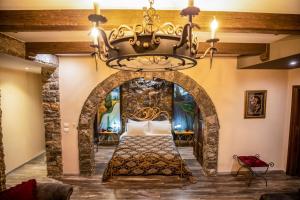 Postel nebo postele na pokoji v ubytování Vila Eden Boutique Hotel