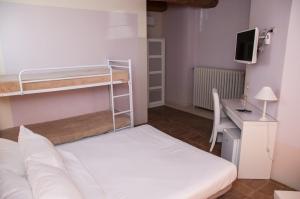 Voodi või voodid majutusasutuse Relais Casetta56 toas