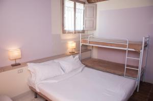 Voodi või voodid majutusasutuse Relais Casetta56 toas
