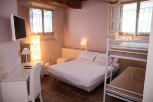 Voodi või voodid majutusasutuse Relais Casetta56 toas